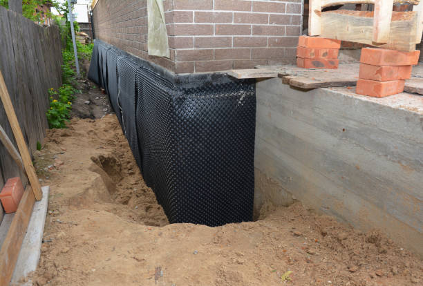 Happy homeowners after waterproofing job in Krakow